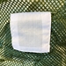 Closeup of ID Tag of Army Green Mesh Net Draw String Laundry Bags 30" x 40"