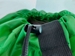 Close up of drawstring toggle on the Green 30x40 Polyester Laundry Bag with Carry Strap