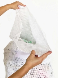 Open Top White Mesh Bag Cinched with a Cable Tie