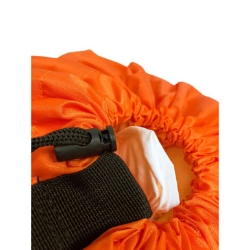 Closeup of toggle and carry strap on a large orange polyester laundry bag